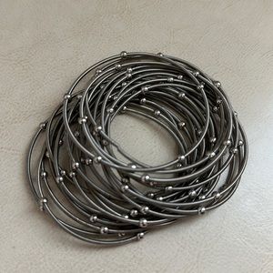 Full set of stretchy, silver bangle bracelets